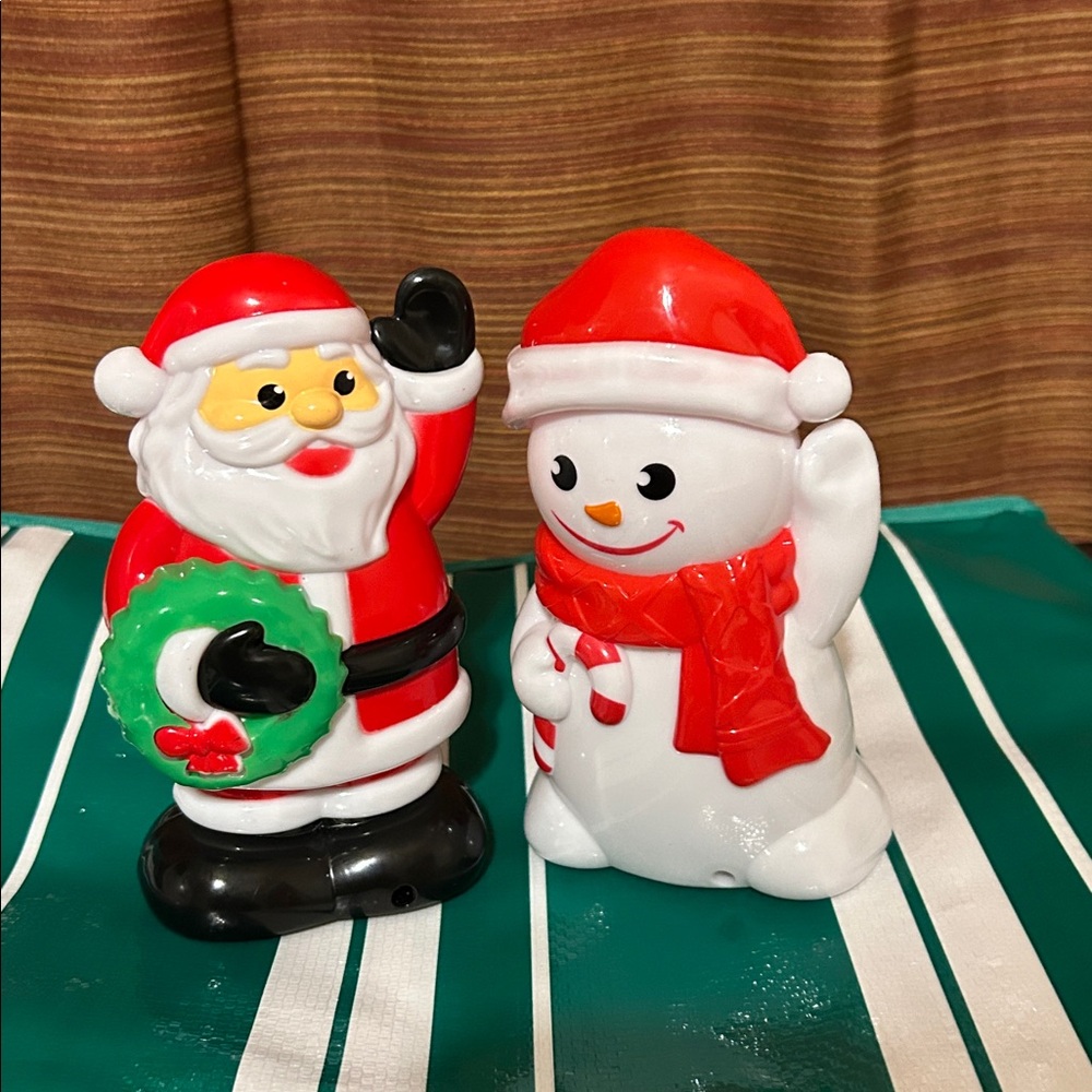 Christmas House Light/Sound Snowman and Santa Claus Figurines. Motion Activated